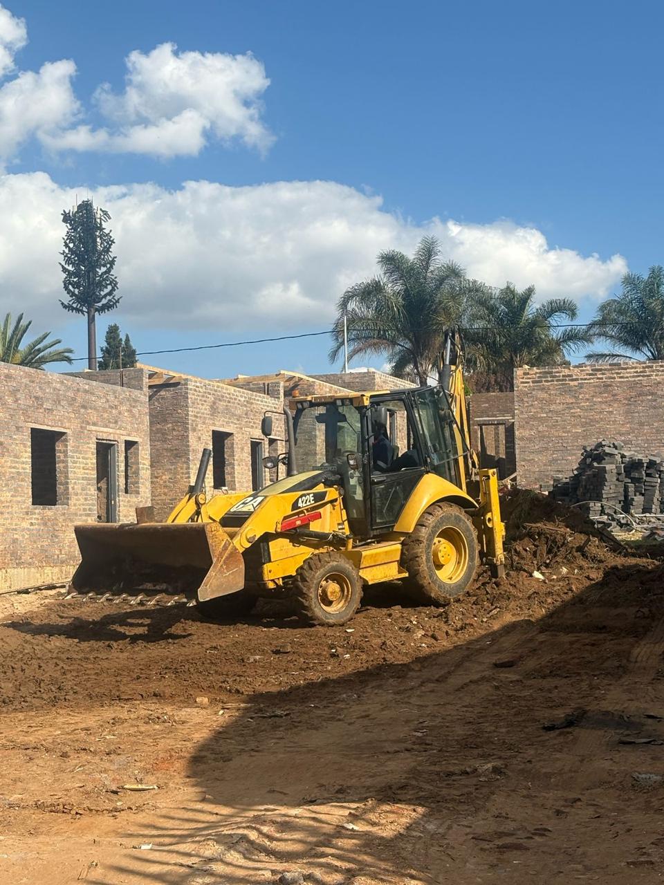 Earthmoving equipment on residential site